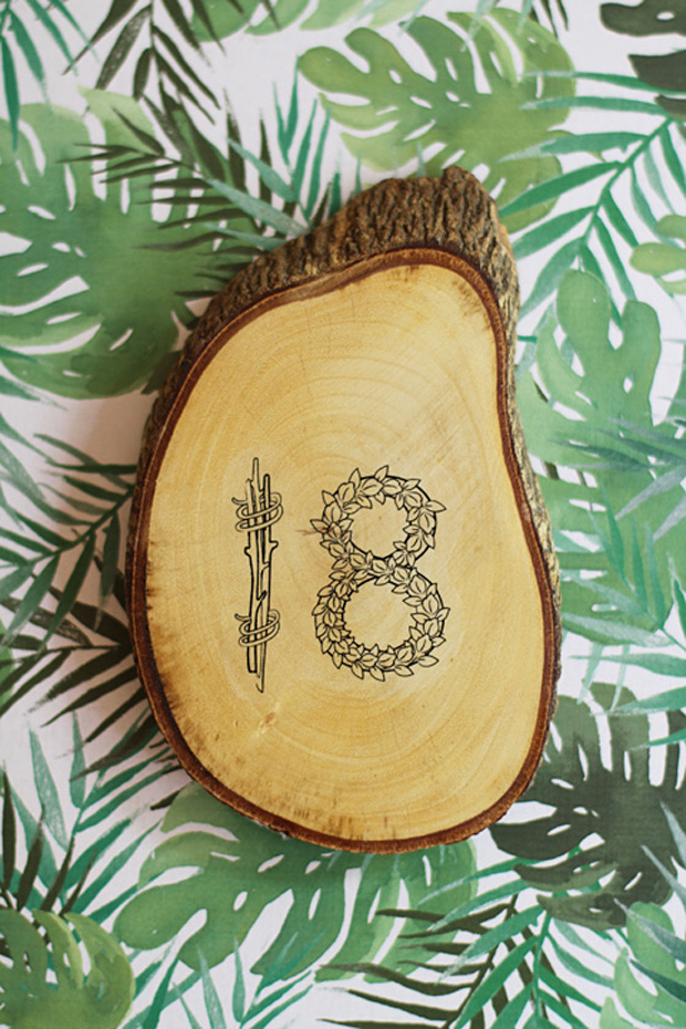 To get the howto for this fab DIY rustic wedding table numbers 