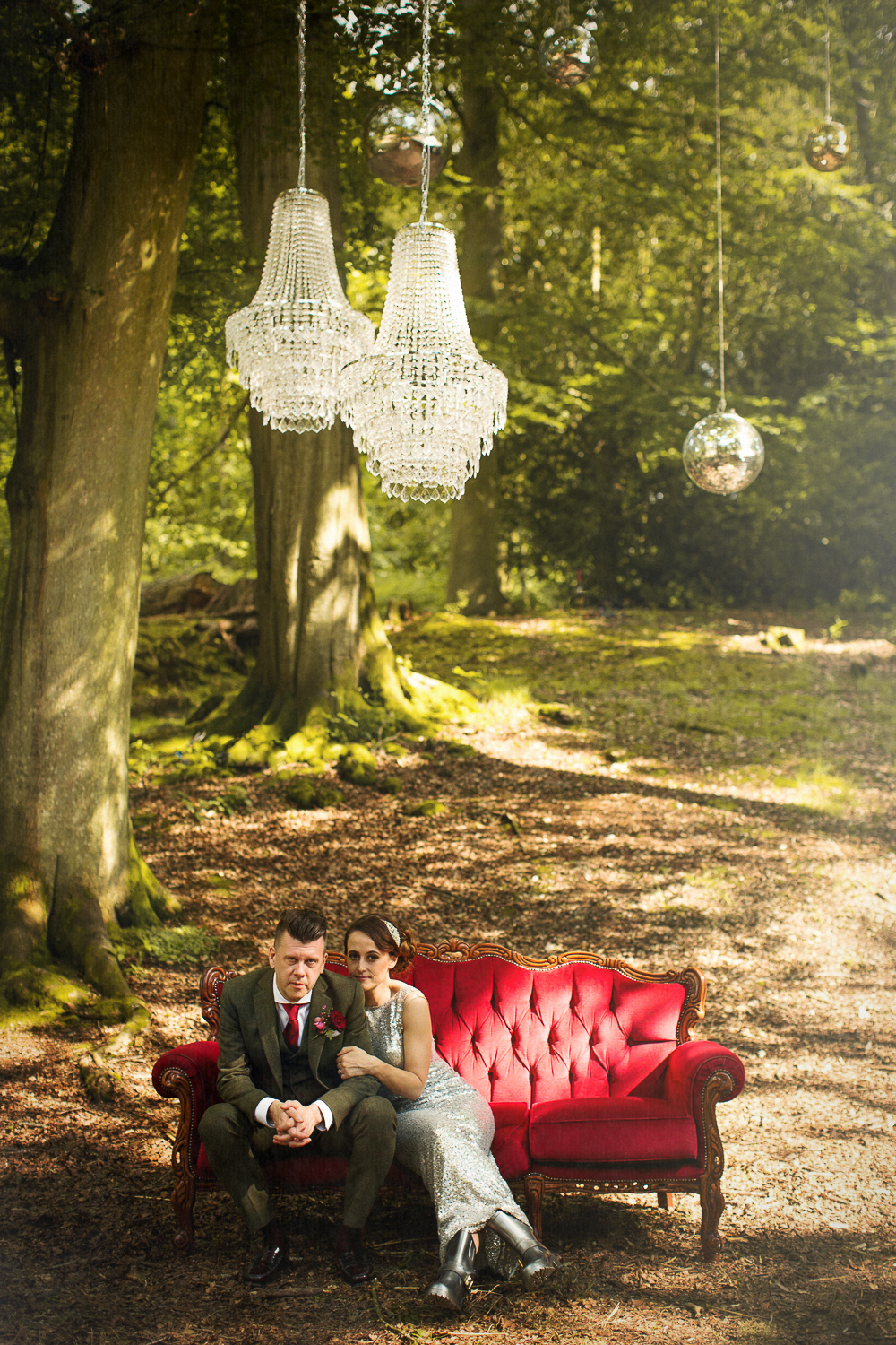 Pocketful of Dreams_matt parry photography_Red velvet furniture_chandeliers_tom Dixon Lights_outdoor_woodland_cool couple