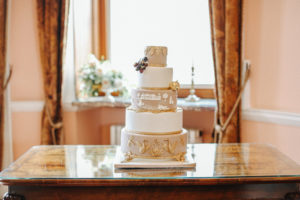 Broughton Hall Luxury Wedding | An elegant, refined, luxury wedding at Broughton Hall in Yorkshire. With subtle 1920's Gatsby influences, an autumnal palette and sumptuously decadent styling. Wedding Planning and Design: Pocketful of Dreams Florals: Swallows and Damsons Stationery: De Winton Paper Co Cake:  Keiron George Photography by: Belle and Beau