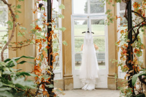 Broughton Hall Luxury Wedding | An elegant, refined, luxury wedding at Broughton Hall in Yorkshire. With subtle 1920's Gatsby influences, an autumnal palette and sumptuously decadent styling. Wedding Planning and Design: Pocketful of Dreams Florals: Swallows and Damsons Stationery: De Winton Paper Co Cake:  Keiron George Photography by: Belle and Beau